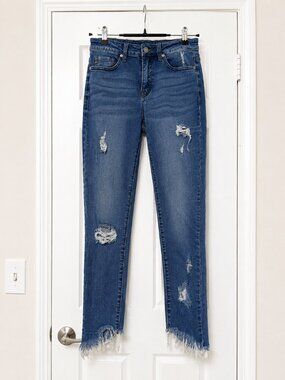 KanCan High Rise Distressed Asymmetric Frayed Hem Skinny Jeans.